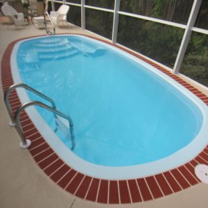 Fiesta 10' x 20' Pettit Fiberglass Pool with brick decking