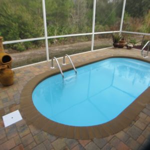 Splash 8' x 16' Pettit Fiberglass Pool with pavers